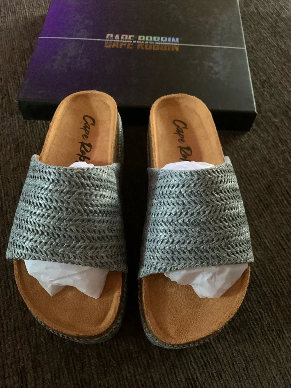Cape Robbin woven platform slides featuring a textured silver upper